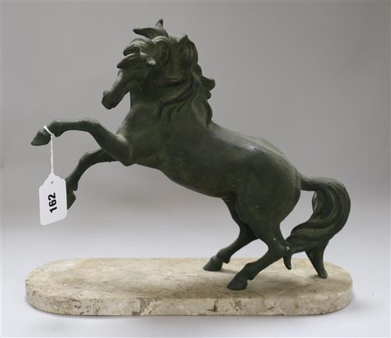 A spelter model of a stallion on marble base height 32cm